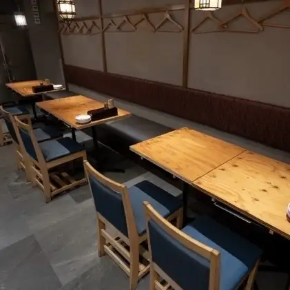 From the table at the very back, you can enjoy a view of the warm lamps.