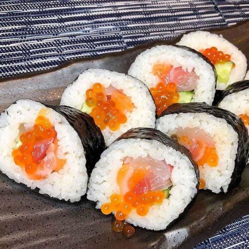 Seafood thick roll ~ topped with salmon roe marinated in soy sauce ~