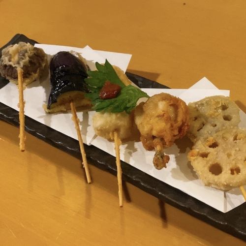 5 skewers of fried food