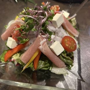 Caesar salad with prosciutto and cream cheese