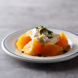 Sicilian-style Caprese with domestic oranges, anchovies and ricotta cheese