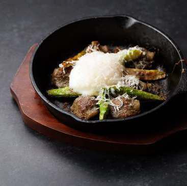 Gizzard confit and spring asparagus baked in a cocotte