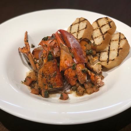ぶつ切りオマール海老の焦がしバターソース
