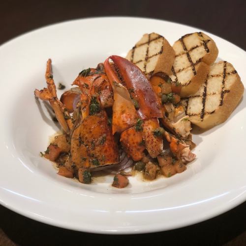 ぶつ切りオマール海老の焦がしバターソース