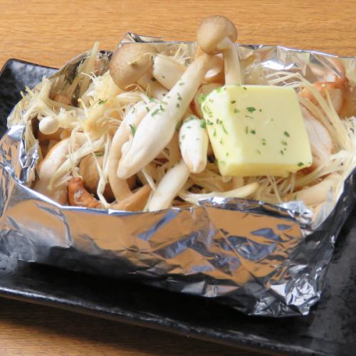 Grilled mushrooms in butter foil