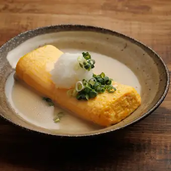 Rolled omelet with the aroma of sea bream broth