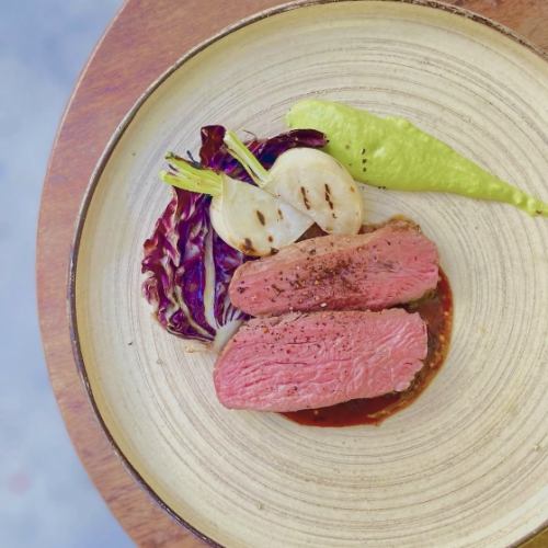 Roasted Wagyu beef from Kurihara City, Miyagi Prefecture, with rosemary and anchovy sauce.