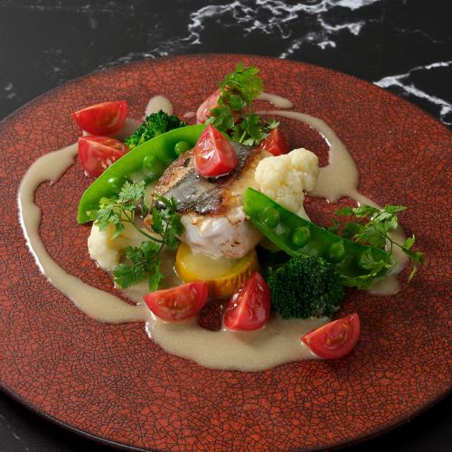 Grilled fish of the day with beurre blanc sauce