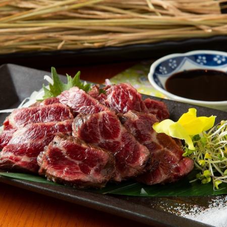 Straw-grilled sashimi of lean horse meat from Kumamoto Prefecture