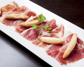 Freshly cut from the log! Iberian ham