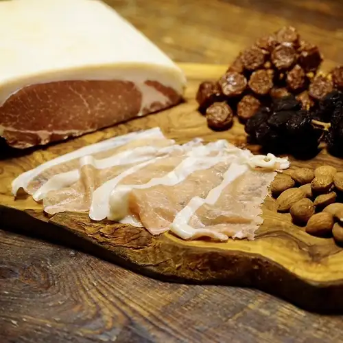 Prosciutto and seasonal fruits