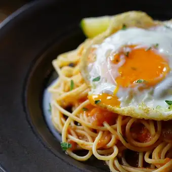 Penne Arrabiata with a fried egg on top