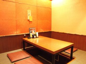 A private room with a sunken kotatsu seating for 4 people.