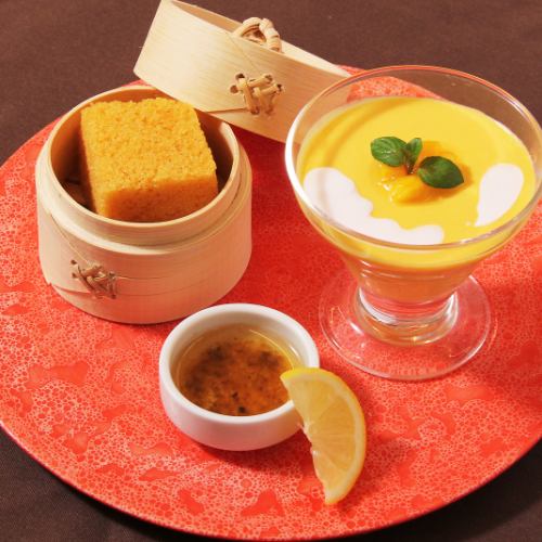 Mango pudding and mala khao served with honey cinnamon sauce