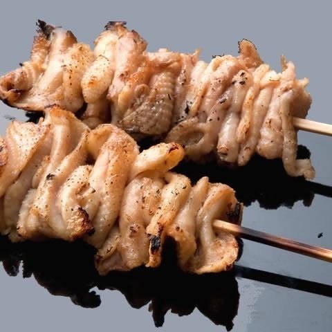 2 chicken skin skewers