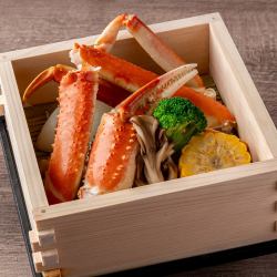 Snow crab steamed in a bamboo steamer