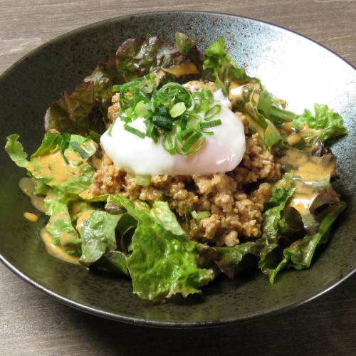 Cobb salad with minced chicken and soft-boiled egg