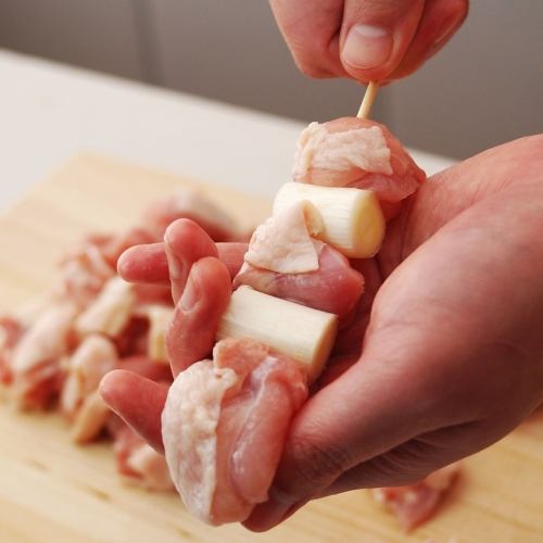 Our yakitori is carefully skewered one by one in our store!