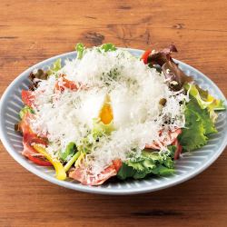 Caesar salad with grilled bacon and soft-boiled egg