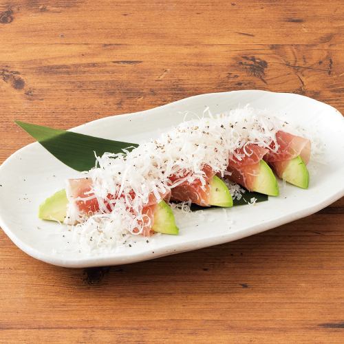 Cheese-filled avocado wrapped in prosciutto