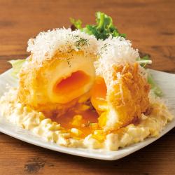 Deep fried potato salad with lots of cheese