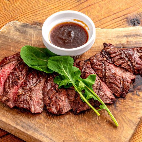 Charcoal-grilled skirt steak with chimichurri sauce