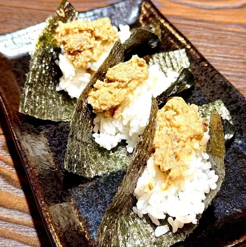 Three bite-sized lamb mayonnaise rice balls