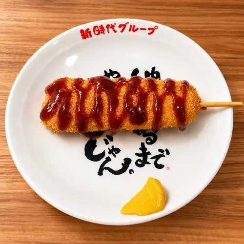 Pork skewers with sauce