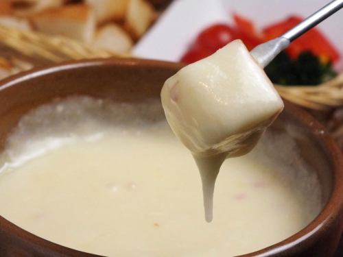 Speaking of AUGGIE is a superb choice of cheese fondue!