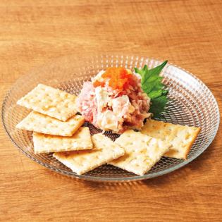 Cream cheese with scallions and crackers