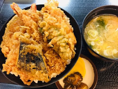 Bowl of rice and fried fish