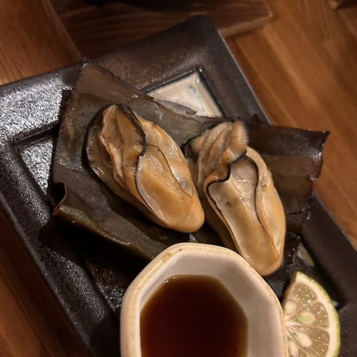 Grilled oysters and kelp