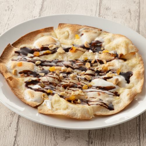 Dessert pizza with raw chocolate and marshmallow