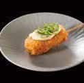 Rare fried salmon skewers