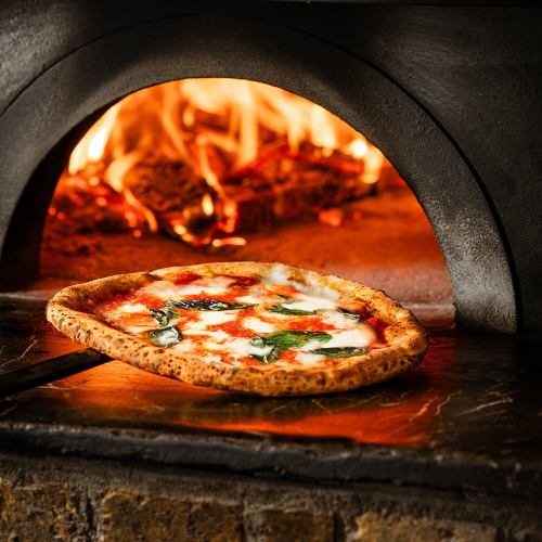 Authentic Neapolitan pizza baked in a wood-fired oven