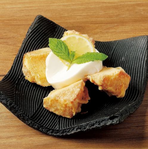 Baumkuchen served with rice mousse