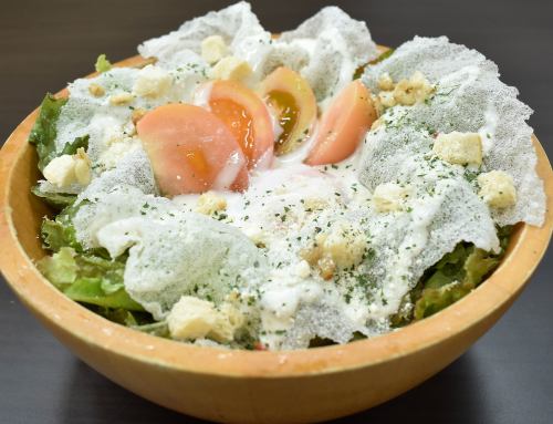 Caesar salad with soft-boiled egg and parmigiano