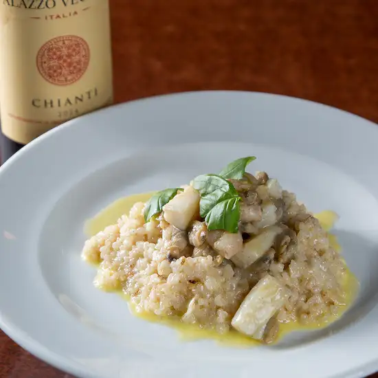 [Enjoy the bounty of the sea] Savor a superb risotto with fresh mussels and shrimp dancing in the broth.