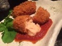 Crab cream croquette with falling cheeks