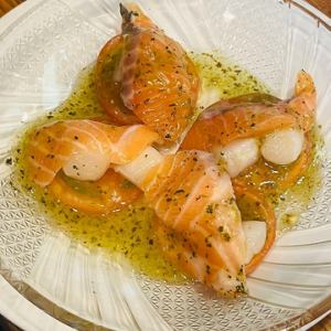 Marinated salmon, clams and tomatoes