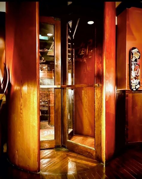 When you go down the stairs leading to the basement, you will be greeted by a stylish revolving door.
