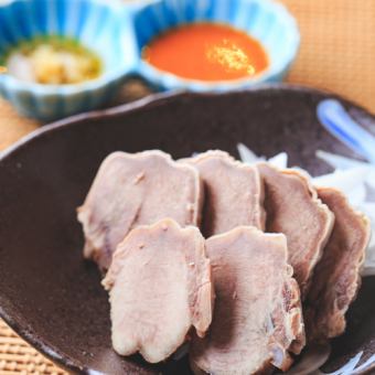 Boiled pig stab tongue, gut, heart