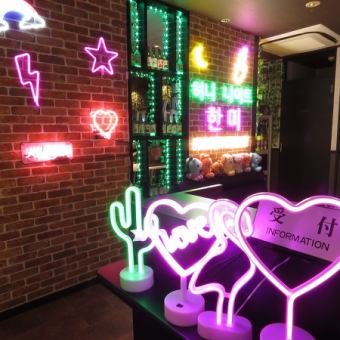 The reception is also decorated with neon lights, and once you step out of the elevator you'll find yourself in a Korean space!