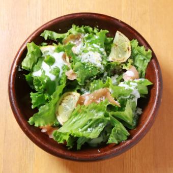 Caesar salad with roasted lemons and smoked salmon