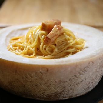 Rich carbonara finished in a cheese bowl