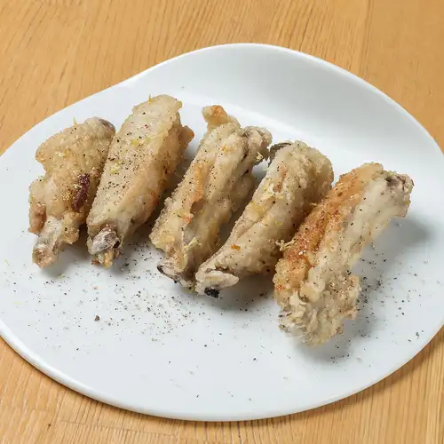 Chicken wings and spare ribs with lemon pepper