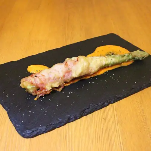 Asparagus and bacon fritters with paprika sauce