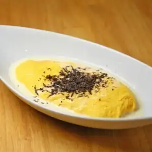 Omelet with truffle and porcini mushroom white sauce