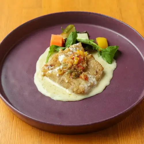 Pan-fried white fish with butter cream sauce