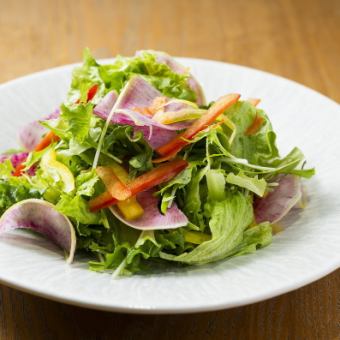 Green salad made with local leaves and served with kabosu dressing